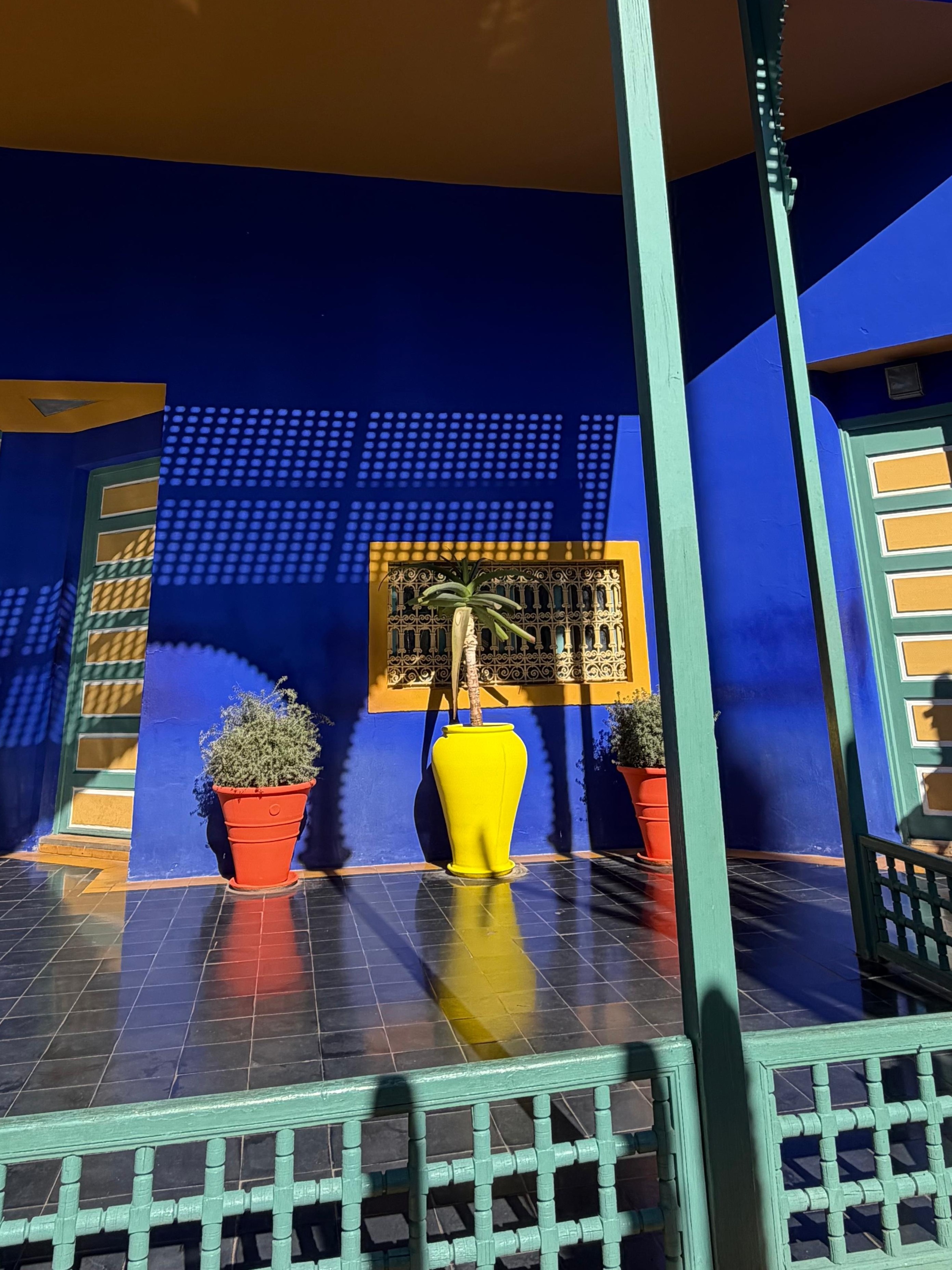 Marrakech at golden hour — rooftops, palms, and the layered rhythm of culture, craft, and atmosphere